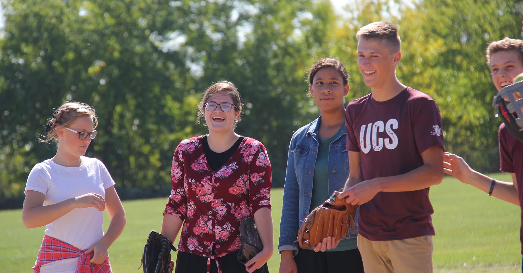 UCS students playing softball